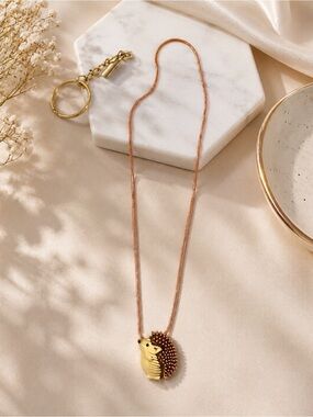 paparazzi Gold and Brown Hedgehog Pendant Necklace